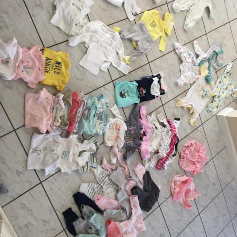 Over 90 pieces newborn and 0-3